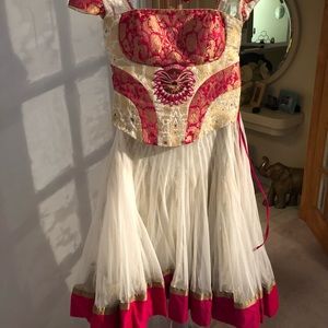 Midi skirt high low length lehenga. Very unique.